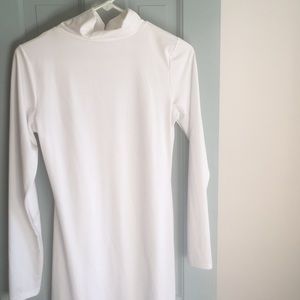White long sleeve turtle neck dress.